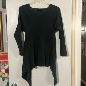 Matthildur green ribbed raglan sleeve round neck sweater. Asymmetrical hem